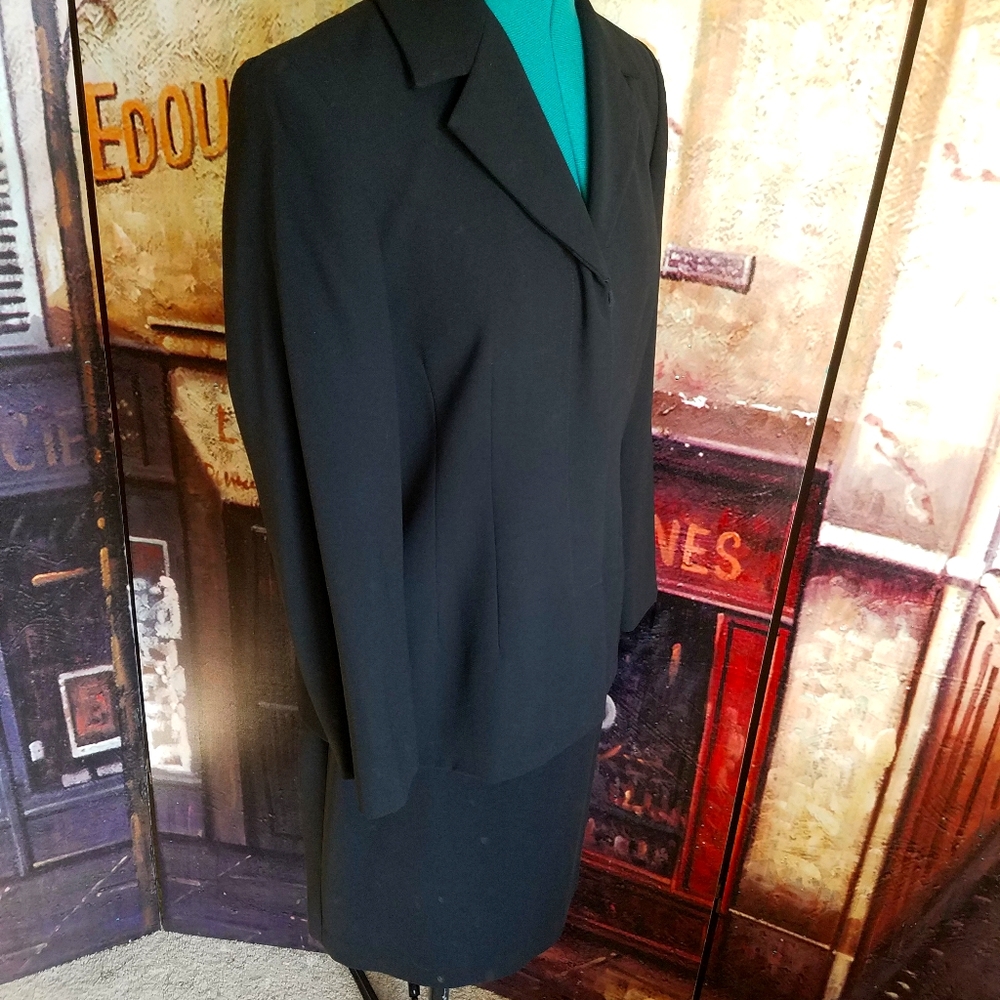 Classic styling 2 piece black suit with skirt